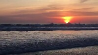 Stille Oceaan met ondergaande zon