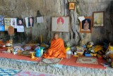 monk in temple cave
