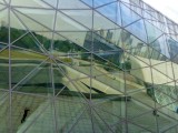 Reflectie van het CBD in het Gaungzhou Opera House