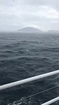 Regenbui tijdens walvissen cruise