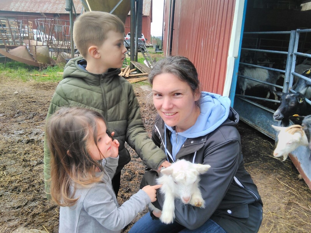 Goat-hugging on the goat-farm.
