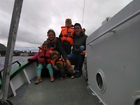 All together on the fishing boat