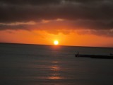 zonsondergang vanuit bed