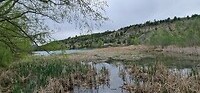 Uitzicht vrije camperplaats Plan d´eau Le Riou Saint Genis