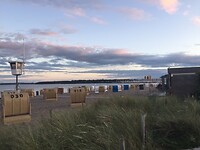 Boulevard en strand bij Strande