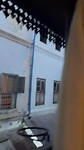Balkon en straatbeeld Emerson Spice, Stone Town