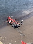 Boot naar strand slepen