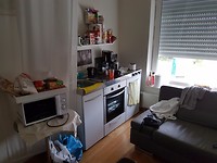 Onze woon/slaapkamer inde Mayflower Flat en Spa 1