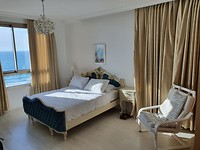Slaapkamer met uitzicht op zee