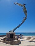Bronzen beeld aan begin Malecón