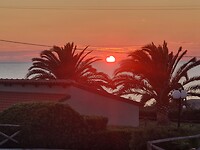 Zonsondergang vanaf ons balkon