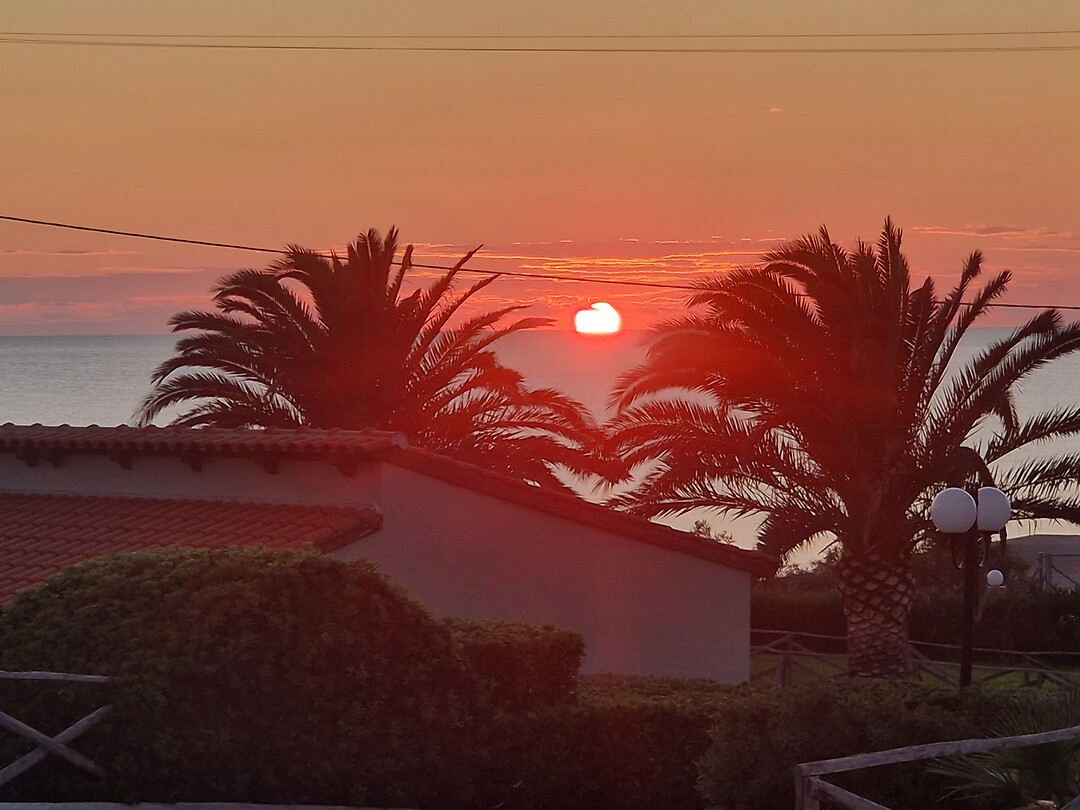Zonsondergang vanaf ons balkon