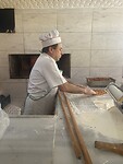 Turkse pizza bakker
