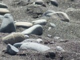 Met zwart zand!
