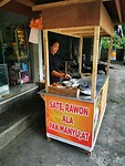 Het kraampje voor de winkel