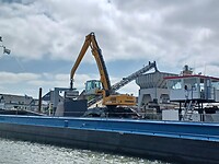 Zand lossen vanaf de Zandloper.