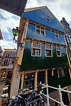 Dit pand uit 1573 zou door een kogel getroffen zijn.