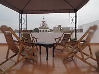 Dakterras met uitzicht, hotel Colonials