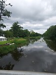 Water uitzicht met huisje