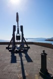 Verdediginswapen op de vestingsmuur van Alghero