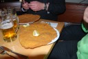 Schnitzels die over je bord hangen