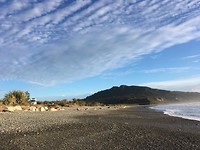 Beach with camper in the back