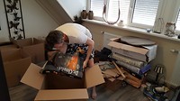 Druk alle dozen aan het inpakken!