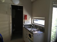 Kitchenette en badkamer