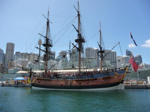 Old fashion boat, new modern skyline