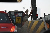Een werkplek minder bij de toll gate, vervangen door een robot