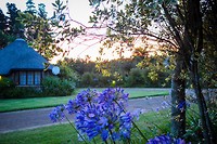 Zonsondergang bij Coral Tree Cottages