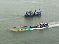Vissersboot komt en gaat