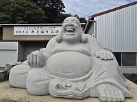 10764