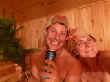 Inside the banya - wave the fir wood for smell, wear the felt hat as protection against the heat!