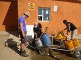 Getting water from one of the few watersupply houses a few hundred meters away