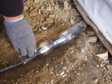 Before adding the soil to the bottom protecting powerline by...