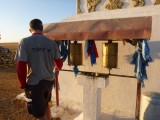 Turning the praying wheels at a Stupa