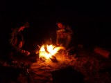 BBQ outside in the desert under the pitchblack sky and the stars....