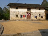 Drying the clothes and drying the rice!