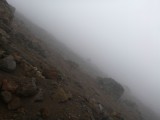 It is quite steep and the rocks loose.... half way up we found out there is a rockface, which made