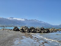 Zon, zee, strand en bergeb