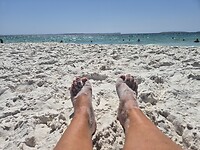 Voetjes in het witte zand