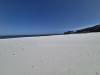 Uitzicht witte strand