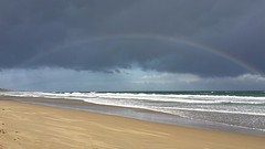 die regenboog bij Aireys Inlet komt precies van de vuurtoren