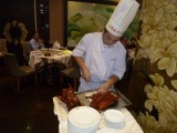 De Peking Duck wordt gesneden