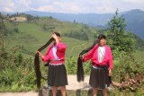 Traditionele kleding en haardracht Ping An