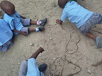 Tekenen in het zand