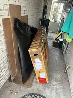 1 fietsslot en een fietshoes in de schuur