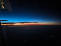 Zonsopgang in het vliegtuig