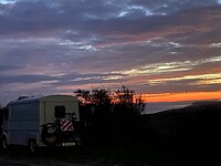Bus met zonsondergang